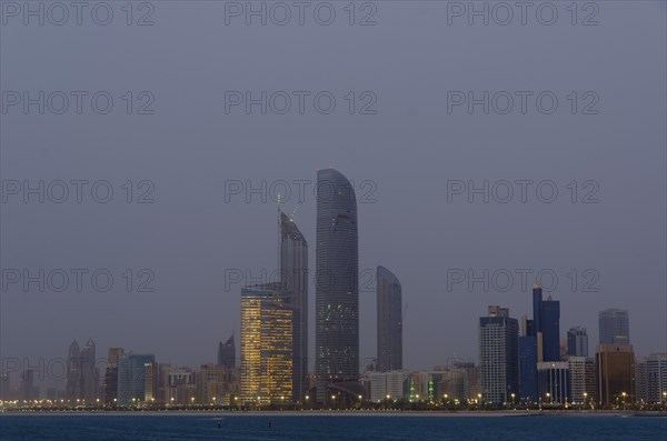 The skyline of Abu-Dhabi at dusk