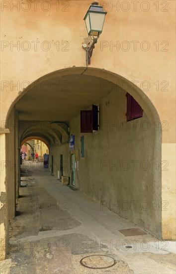 An arcade in the center of Algajola