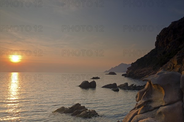 The Gulf of Porto with the surrounding mountains at sunset