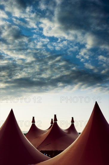 Circus tents and an evening sky