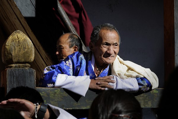 Spectators at a monastery festival in Jakar Dzong fortress