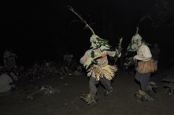 Pygmies of the Bakola people celebrating with song and dance