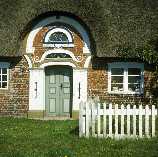 Country house with thatched roof