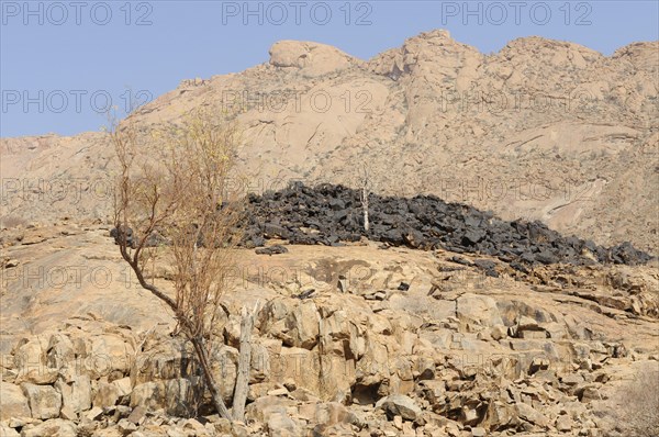 Mountain landscape along a trail to the White Lady rock painting in the Tsisab Gorge