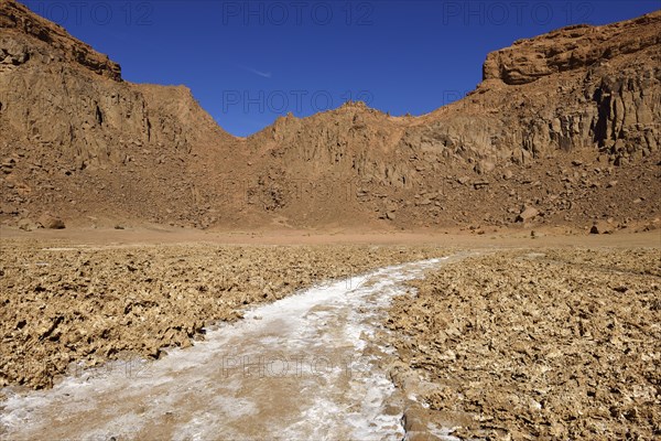 Salt pan in the volcanic landscape of the lower Ouksem Crater