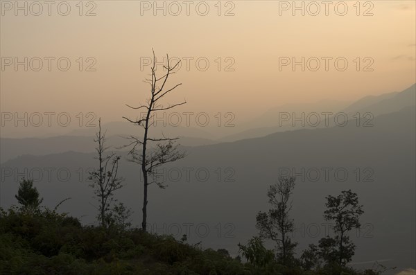 Sunset over Annapurna range in clouds