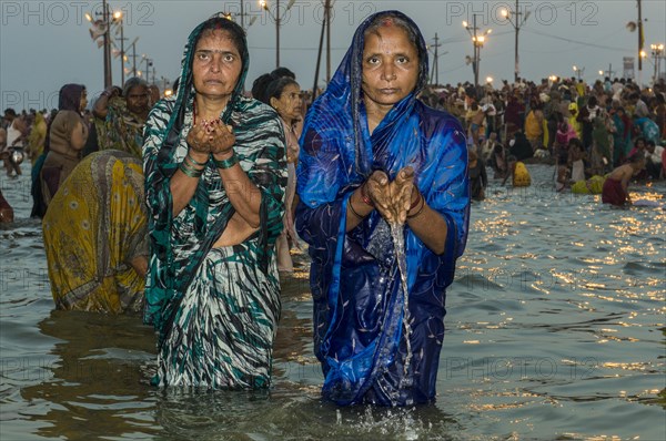 Women taking a bath in the Sangam