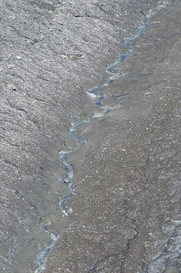 Melting water of the Pasterze Glacier on Grossglockner Mountain
