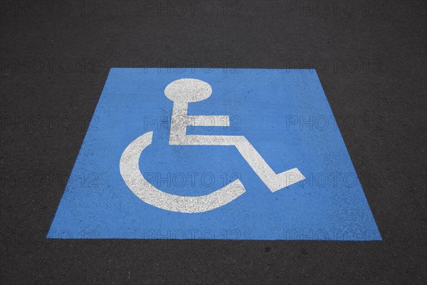 Pictogram of a parking space for disabled persons