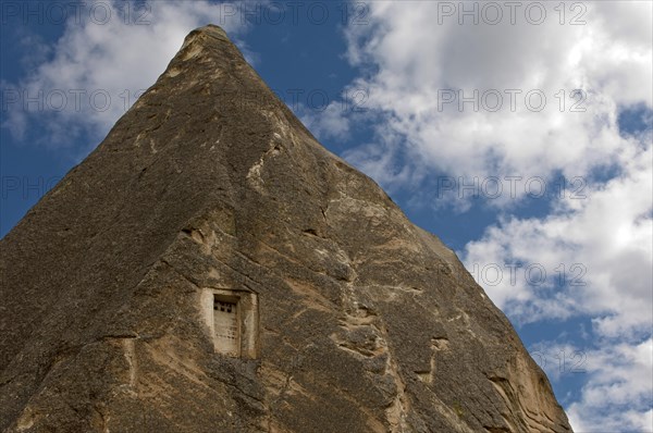 Entrance hole to a dovecote in a tuff cone