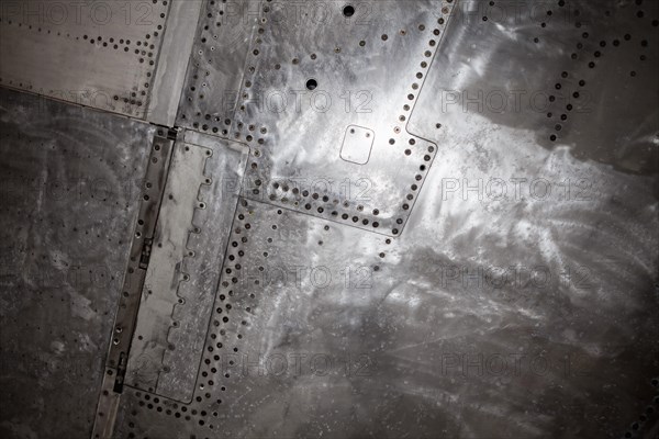 Rivets and screws in the outer skin of an aircraft from the 60s
