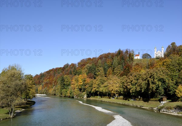 Isar river near Bad Toelz with the St Leonard's Chapel and the church of the Holy Cross