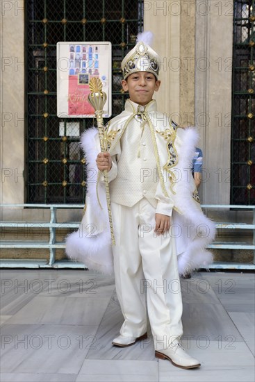 Turkish boy wearing traditional clothing during a circumcision ceremony