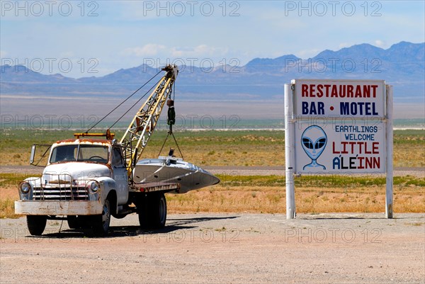 UFO hanging on the tow hook in the car park of the "Little A'Le'Inn" pub