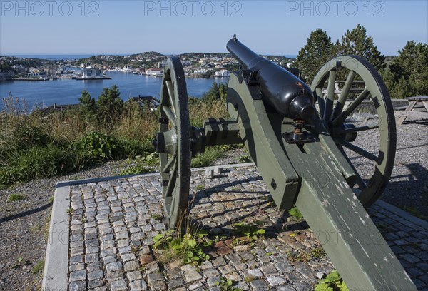 Historic cannon on a hill overlooking the city