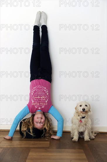 Girl doing a headstand