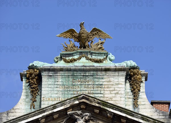 Eagle sculpture on a guild house