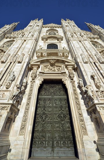 Bronze main door with scenes from the life of Mary