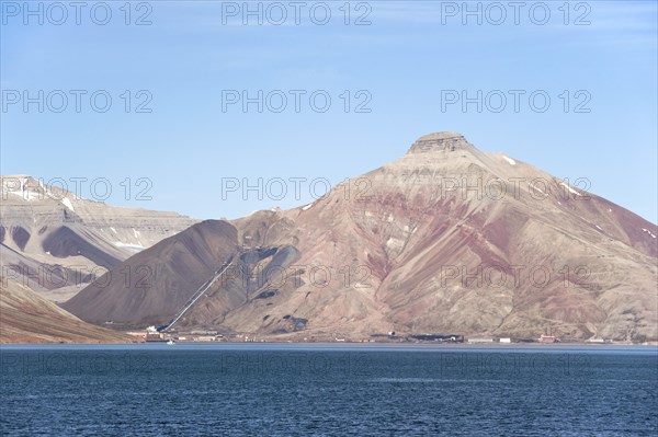 Abandoned Russian mining town of Pyramiden below the mountain of the same name
