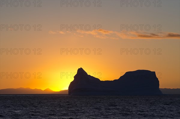 Iceberg at sunset