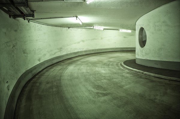 Narrow and dirty access to a multi-storey car park