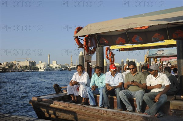 Passengers on an Abra boat