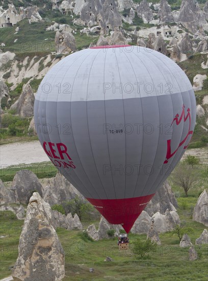 Hot-air balloon flight over the Fairy Chimneys made of tufa