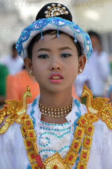 Buddhist girl dressed up to celebrate the novitiation ceremony