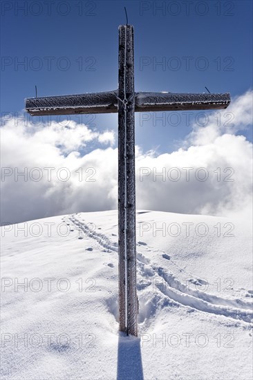 Summit cross of Schwarzhorn Mountain on Jochgrimm