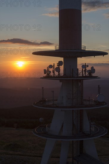 Transmission tower on the summit plateau of Mt Brocken at sunset