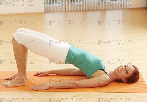 Woman doing pelvic floor exercises