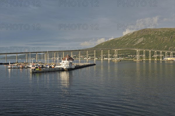 Tromsøsund with Tromsøbrua or Tromsø Bridge in evening light