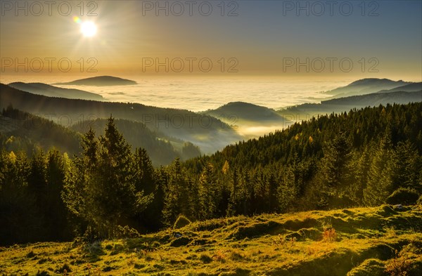 Sunrise with fog in autumn