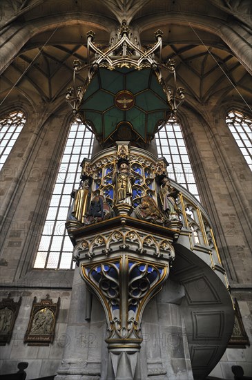 Ornate sandstone pulpit with tracery