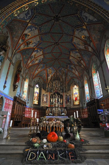 Thanksgiving decoration in front of the altar in the neo-Gothic Parish Church of St. Pelagius