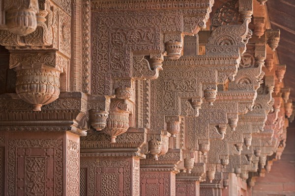 Decorative elements carved on sandstone pillars