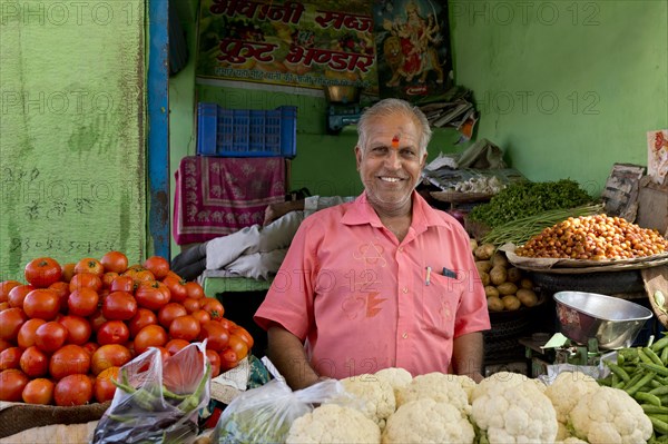 Smiling greengrocer