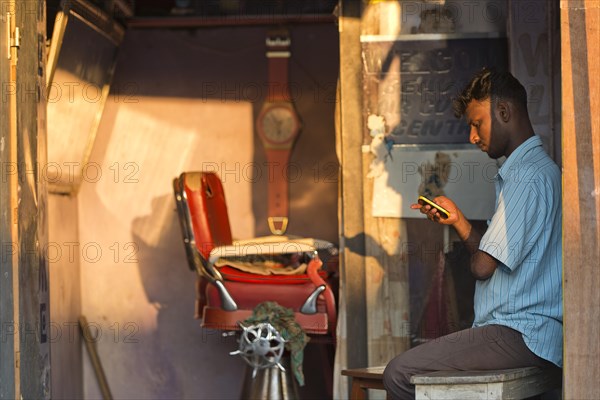 Barber waiting for customers