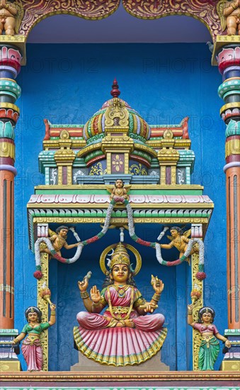 Statue of a goddess on the temple wall