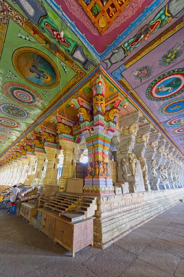 Colourfully painted pillars and ceiling