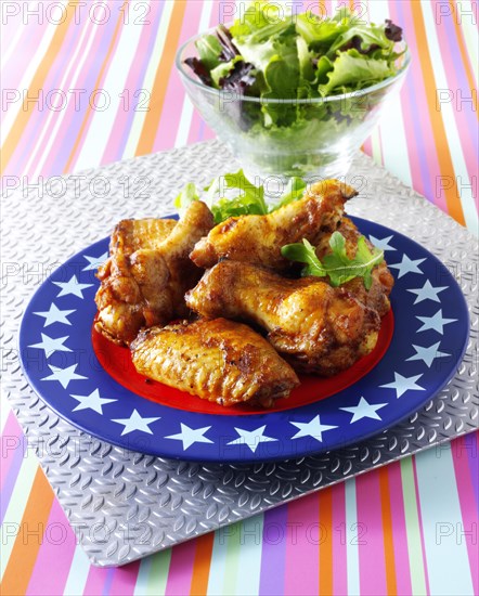 Spicy BBQ chicken wings and chicken drumsticks