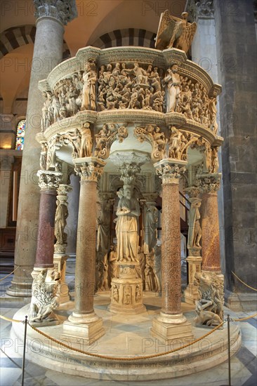 Medieval sculptural reliefs on the pulpit inside the Duomo