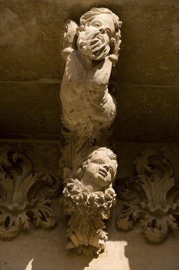 Baroque balcony support sculpture