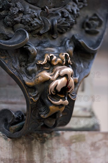 Small bronze sculpture of a lion's head