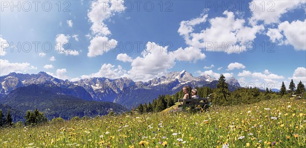 Hikers sitting on a bench