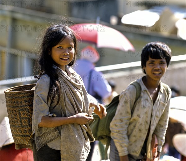 Girl and boy of the Cham or Tscham people