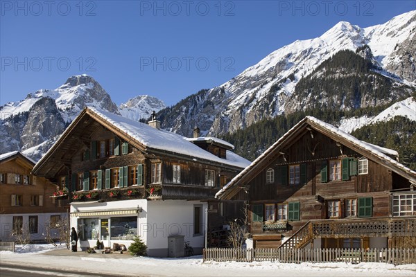 Winter landscape and old wooden houses in Kandersteg