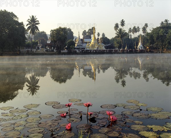 Chedis of Wat Chong Kham and Wat Chong Klang reflected in the Nong Jong Kham lake