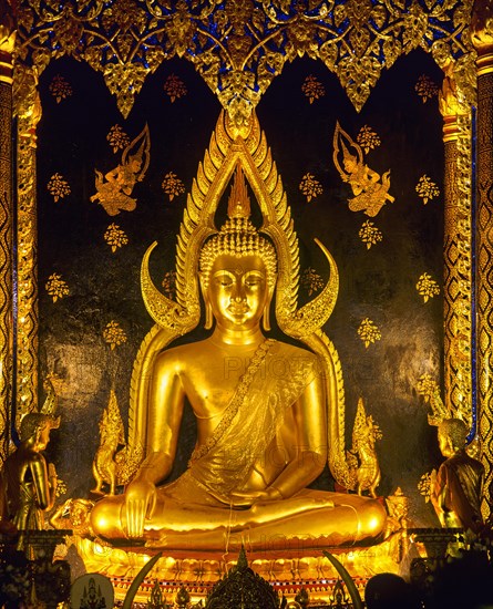 Golden Gautama Buddha Buddha in the posture of overcoming Mara