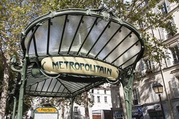 Entrance of the metro station Abbesses with original art nouveau roof